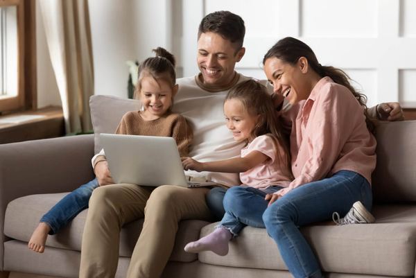 Family relaxing comfortably at home
